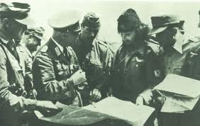 A photograph of a Chetnik officer alongisde Nazi Germans